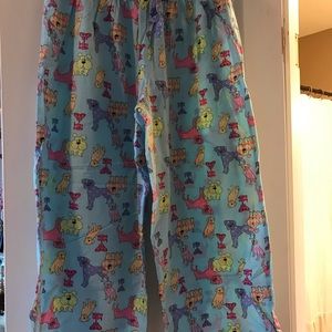 Super cuter pajamas bottoms with dog print size medium.